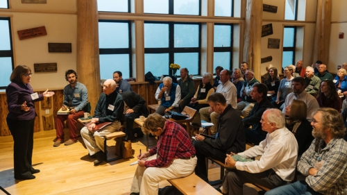U.S. Rep. Ann McLane Kuster '78 (D-N.H.) welcomes participants at the opening of a conference on "The Future of the Northern Forest in a Time of Change" held Monday at Dartmouth's Moosilauke Ravine Lodge in the White Mountains. 