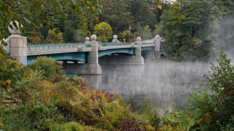 The Hanover bridge over the Connecticut River with mist in the morning.