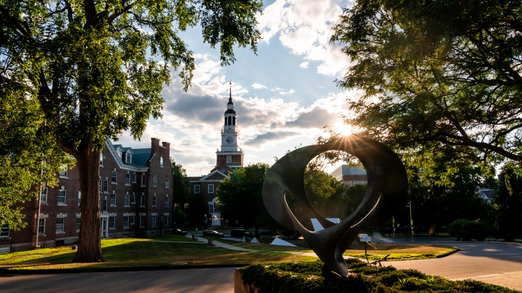 Baker Tower and a sculpture at sunset