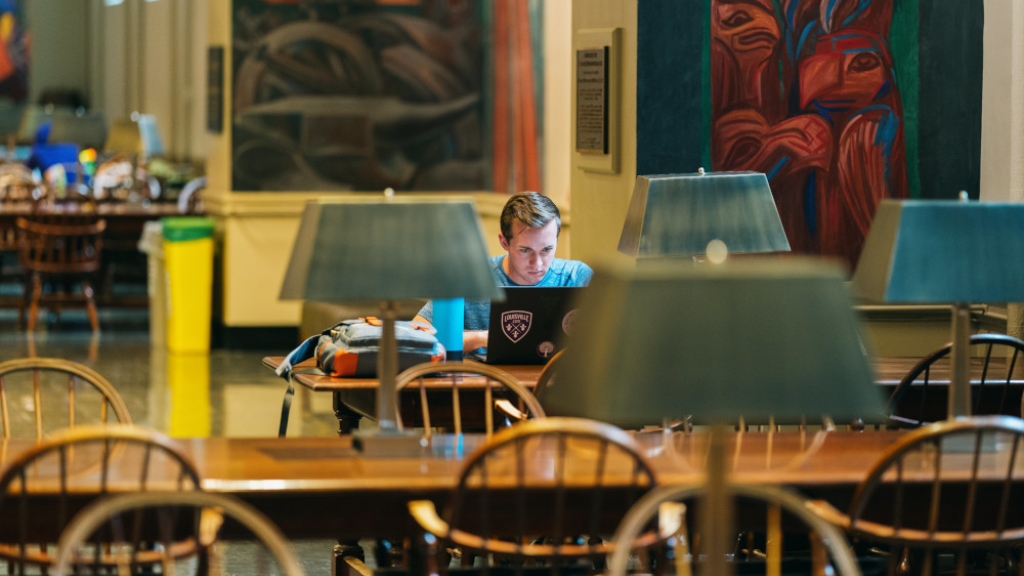 A student studying in the library.